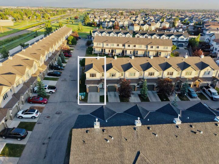 Property Photo: 620 Luxstone Landing SW 207 AB T4B 0B5