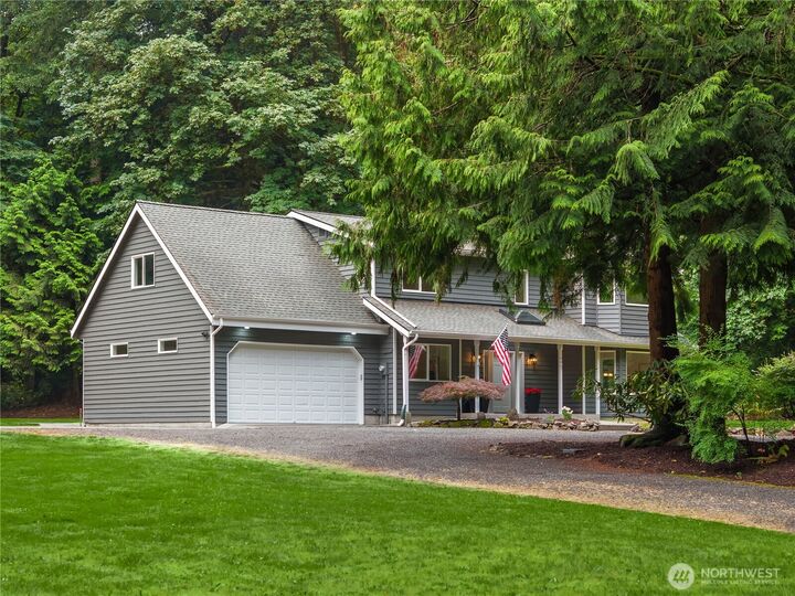 Property Photo:  9067  Hidden Cove Road NE  WA 98110 