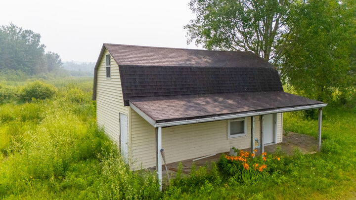 Property Photo:  V/L 10ac Owl Drive  MI 48629 