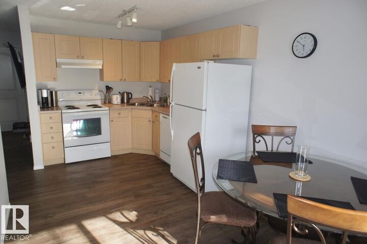 Property Photo: 70 Woodsmere Close 219 AB T8L 4R8