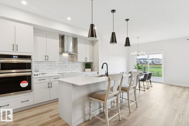 Property Photo: 15666 18 Avenue SW AB T6W 5C2