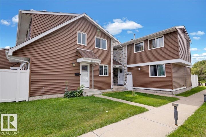 Property Photo: 13225 47 Street NW AB T5A 3L5