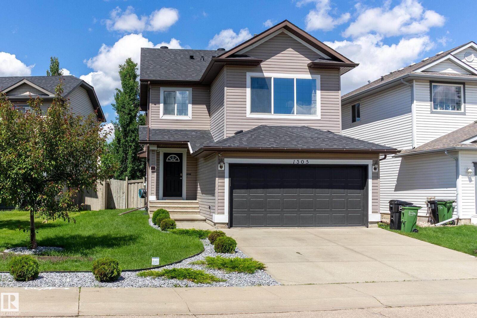 Property Photo: 1305 McAllister Way SW AB T6W 1R5