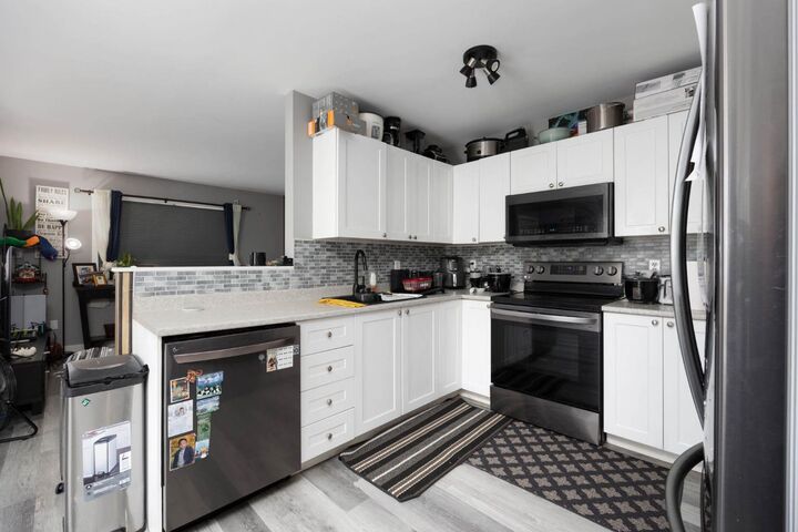 Property Photo: 100 Paish Place 5 AB T9K 2W4
