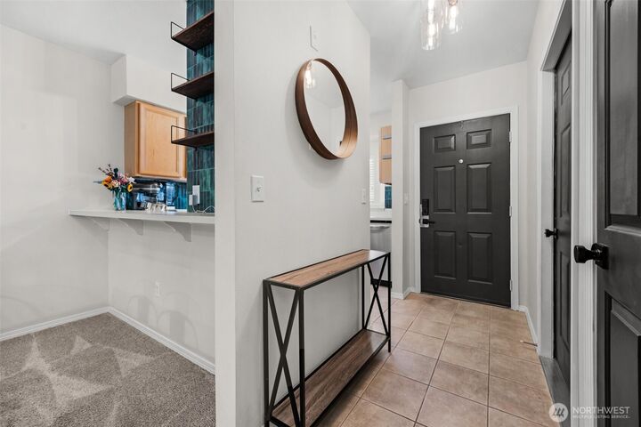 Property Photo:  459  Queen Avenue NE 303  WA 98056 