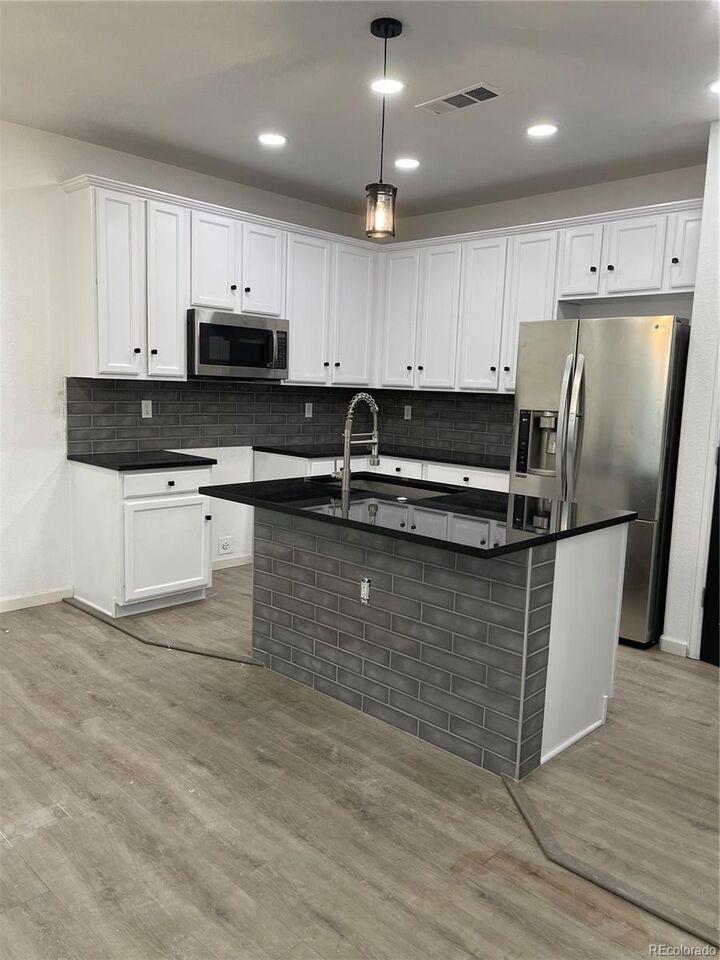 Property Photo:  12965 E Grant Drive A  CO 80241 