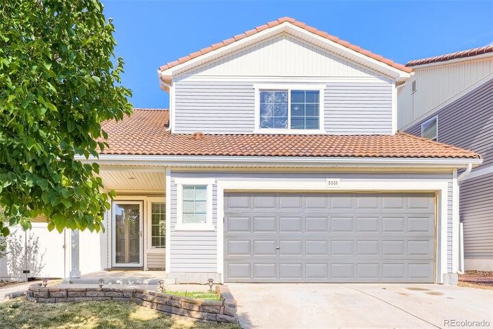 Property Photo: 5551 Halifax Street CO 80249