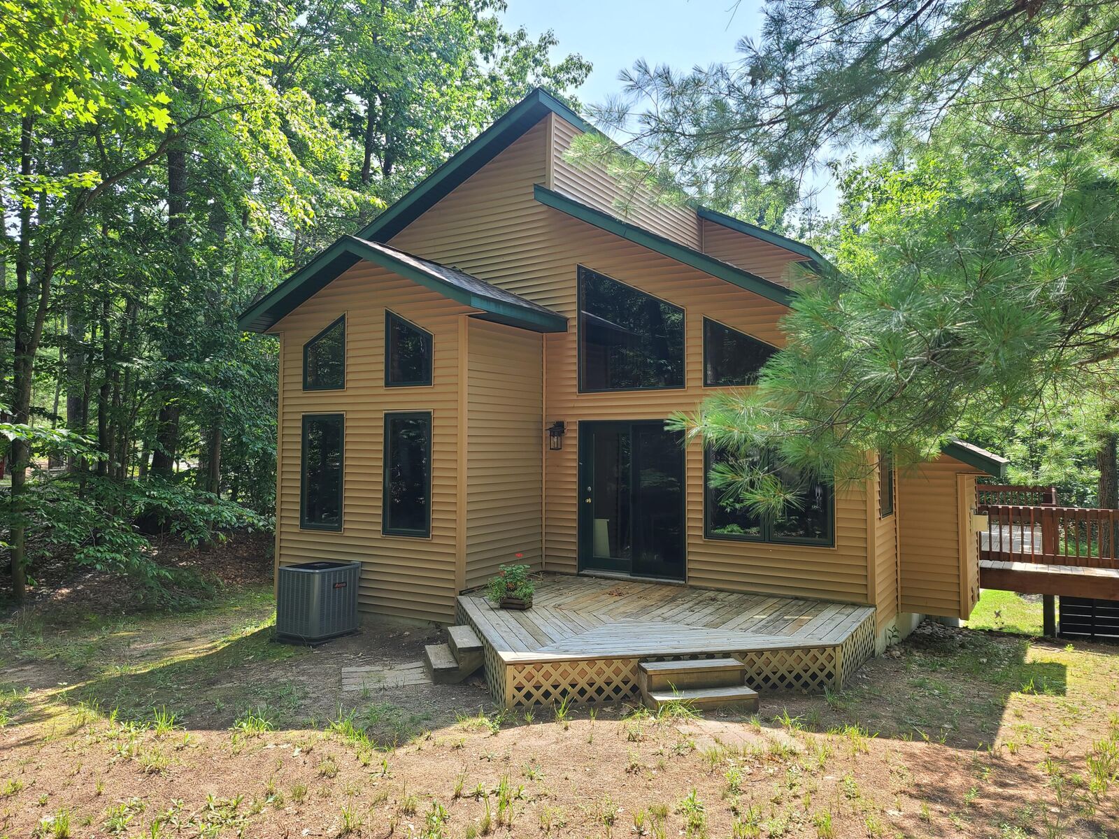 Property Photo:  5861 Arawak Pass  MI 49735 