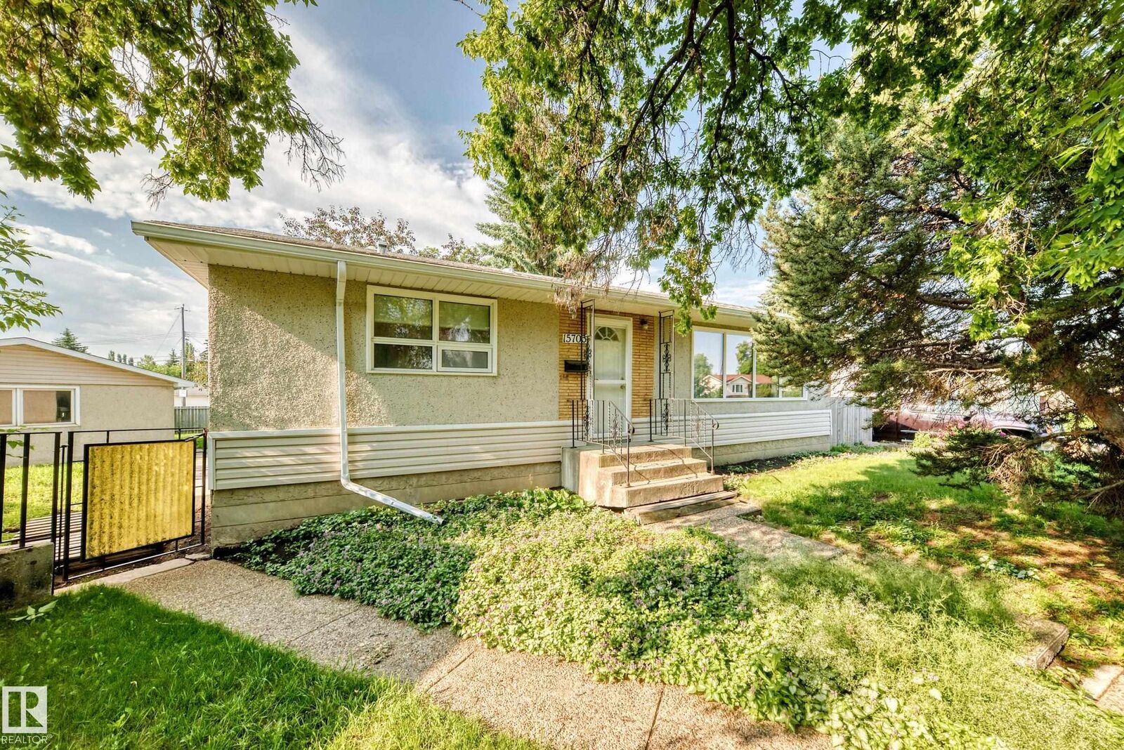 Property Photo: 15703 84 Avenue NW AB T5R 3Y2