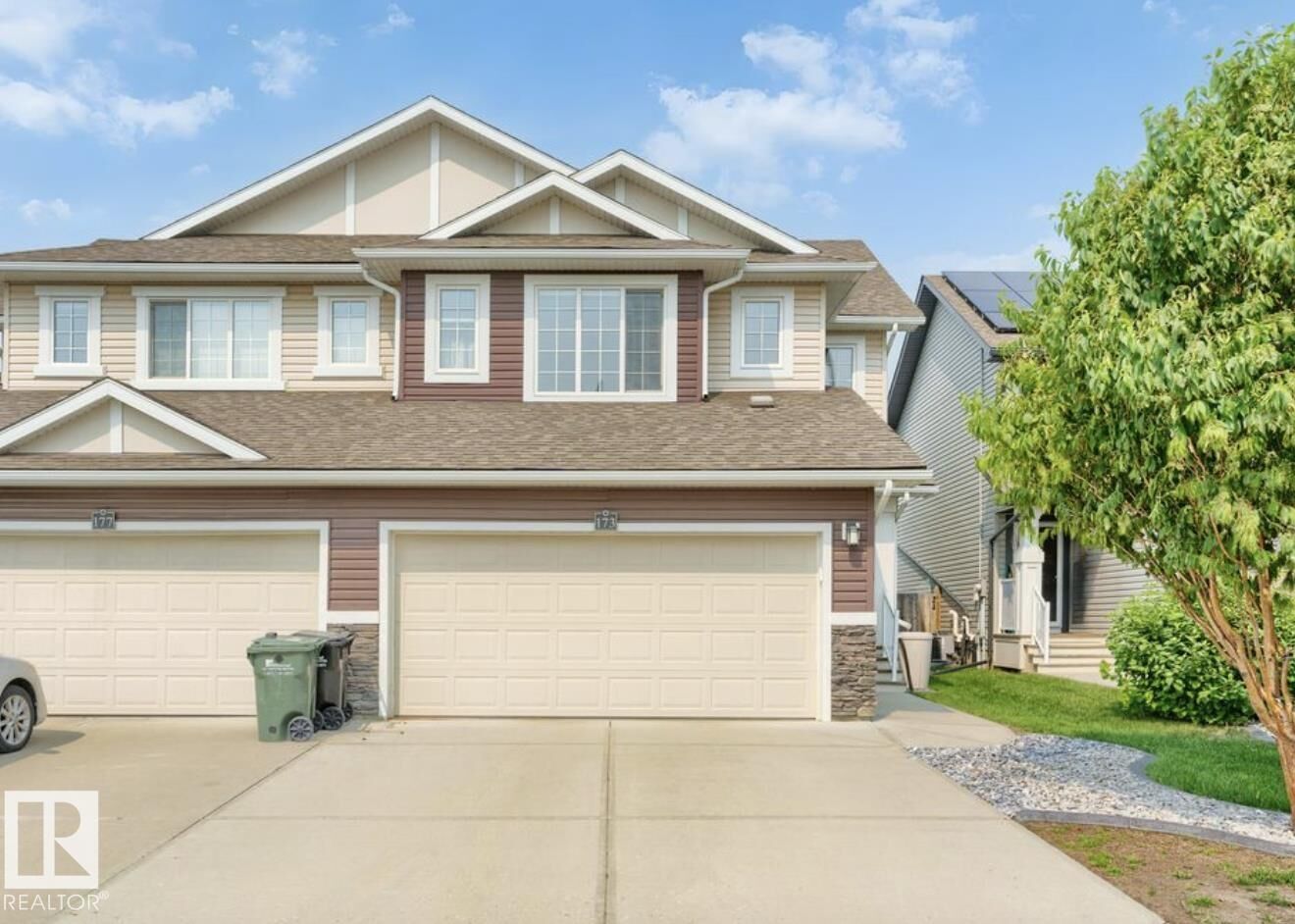 Property Photo:  173 Sunterra Way  AB T8H 0T9 