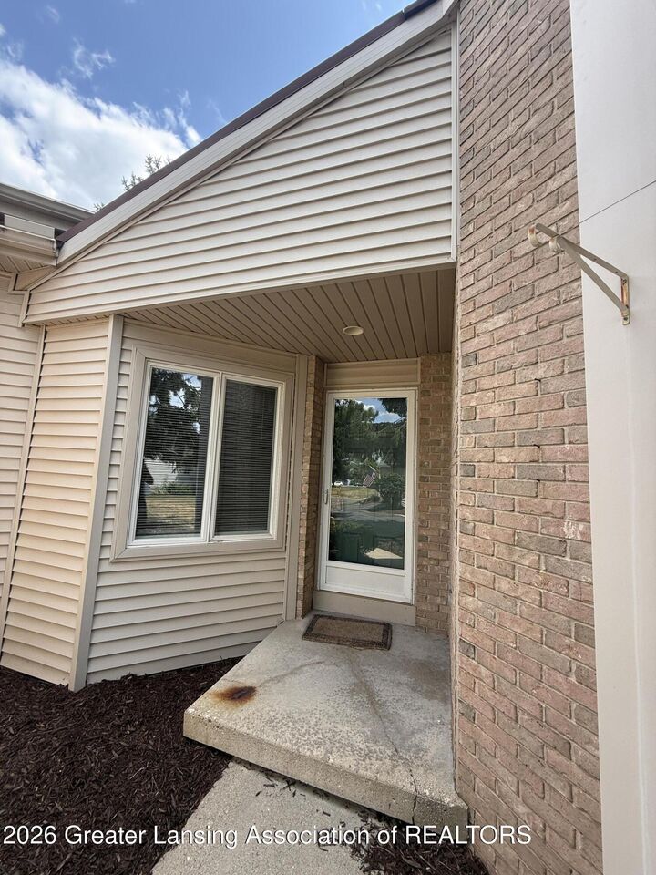 Property Photo:  7103 Treasure Isle  MI 48917 