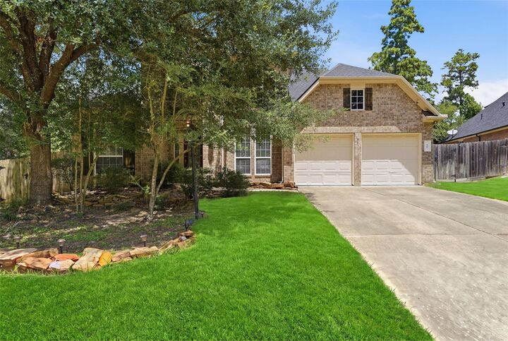 Property Photo: 58 N Scribewood Circle TX 77382