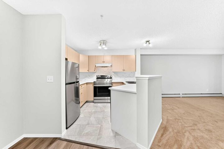 Property Photo:  16320 24 Street SW 1203  AB T2Y 4T7 