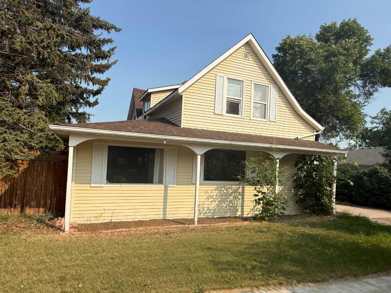 Property Photo: 208 2 Street S AB T0L 2B0