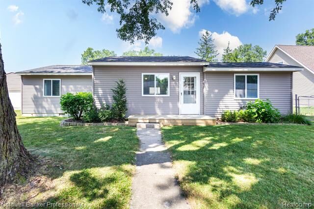 Property Photo:  9031 Garfield Drive  MI 48189 