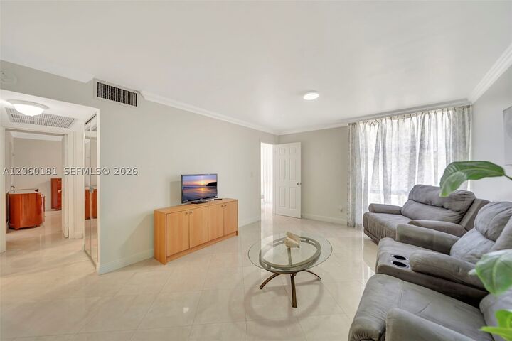 Property Photo:  200 172nd St 220  FL 33160 