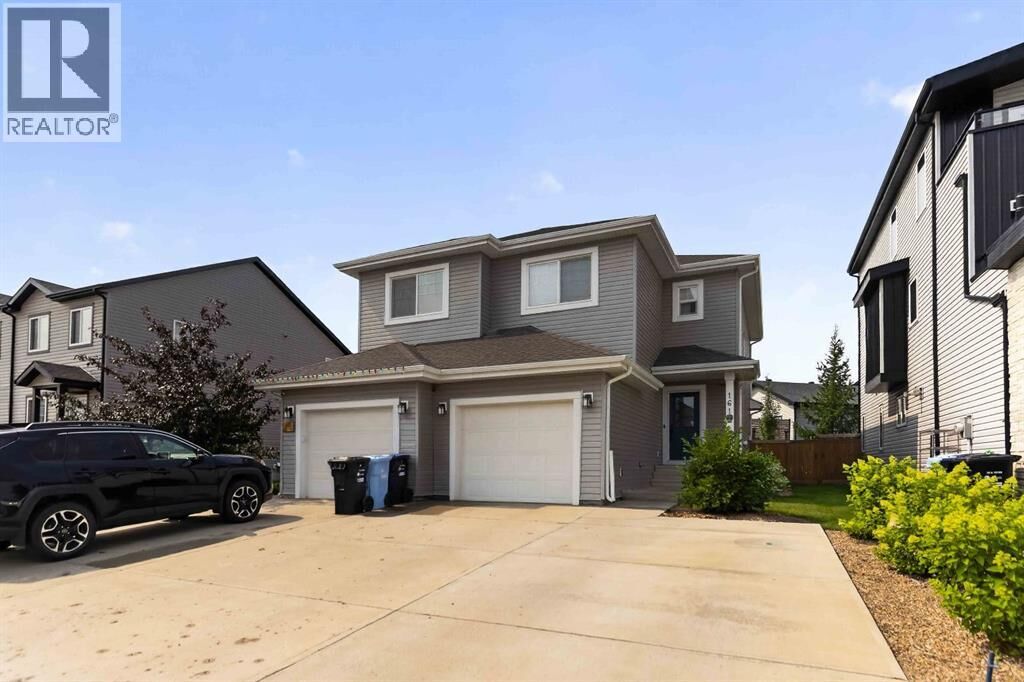 Property Photo: 161 Aldergrove Avenue AB T9J 1E4