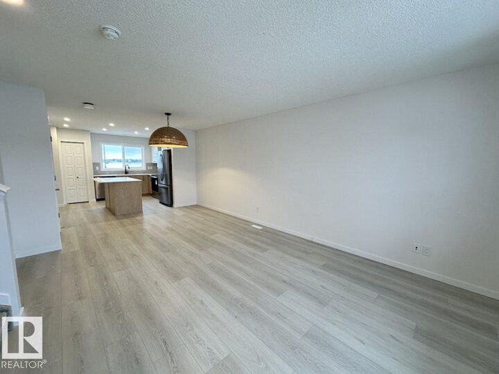 Property Photo:  22803 94 Anenue NW  AB T5T 3Y2 
