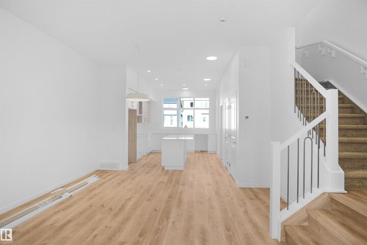 Property Photo: 5115 Parc Reunis Way AB T4X 3E6