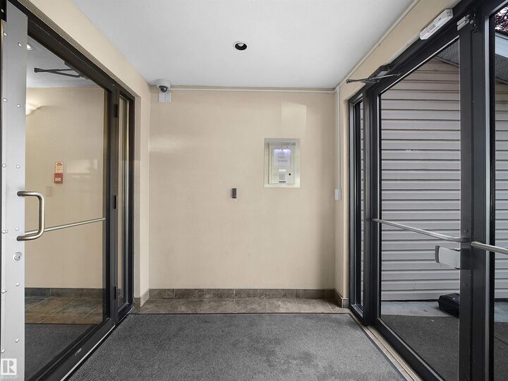 Property Photo: 245 Edwards Drive SW 220 AB T6X 1J9