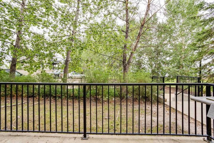 Property Photo:  204 Sparrow Hawk Drive 2103  AB T9K 0P1 