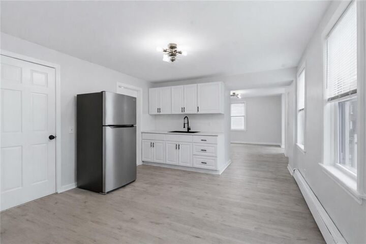 Property Photo:  92 Sylvian Street 1  RI 02863 