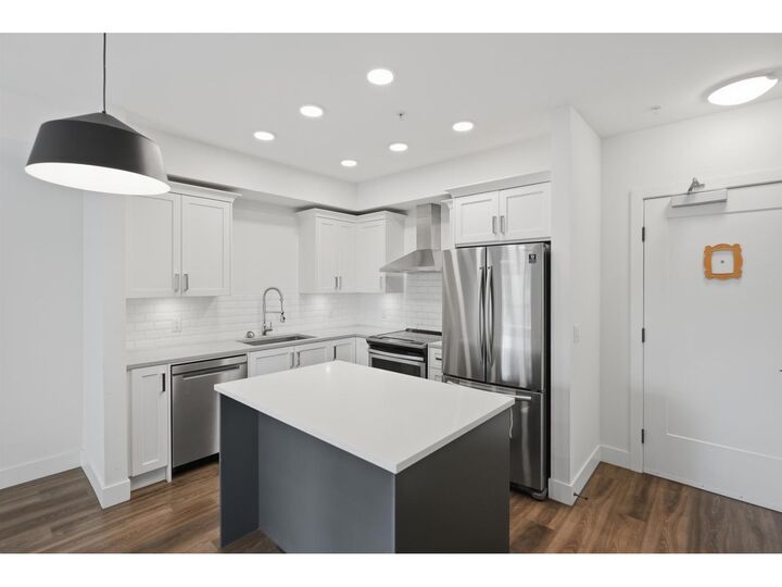 Property Photo:  33568 George Ferguson Way 302  BC V2S 0M3 