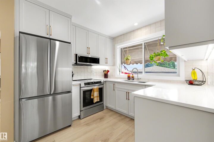 Property Photo:  10732 129 Street NW  AB T5M 0X5 