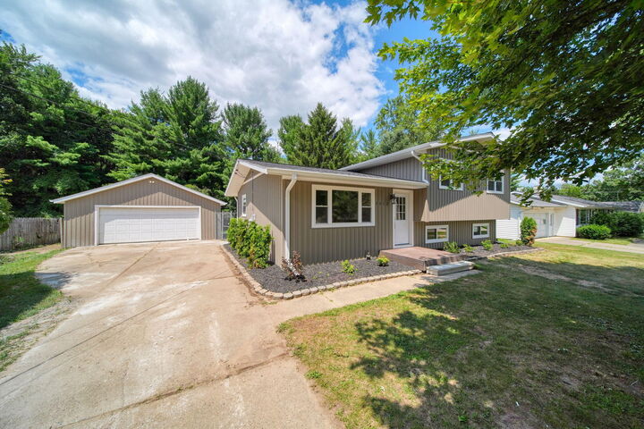 Property Photo:  3012 John Glenn Drive  MI 49201 