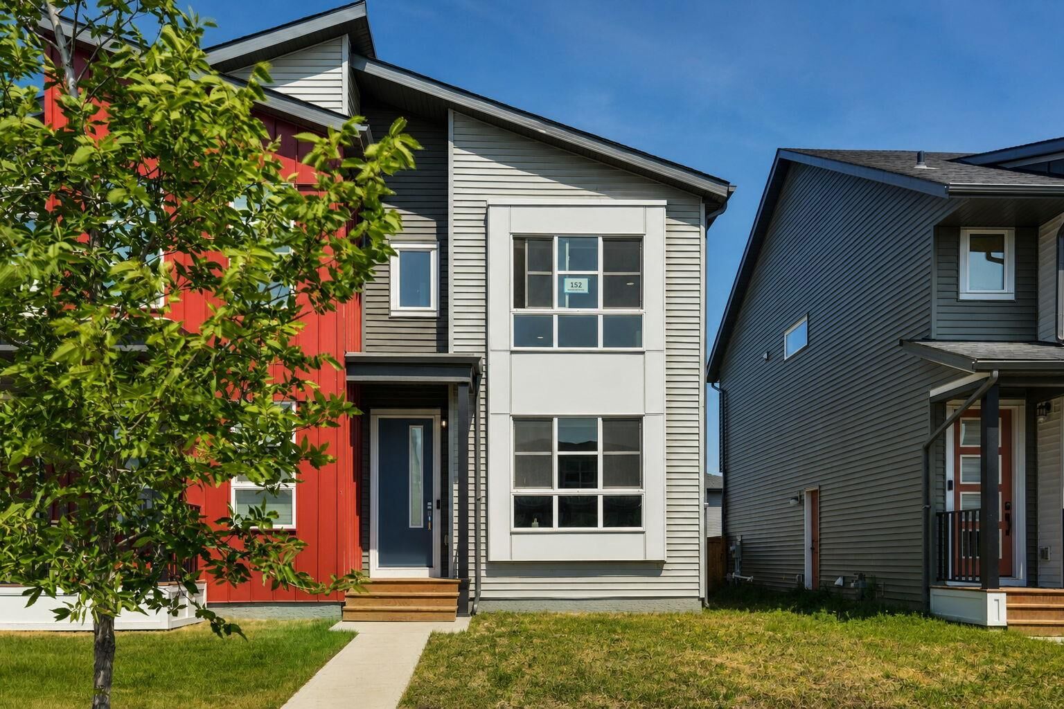 Property Photo: 152 Belmont Way SW AB T2X 5T4