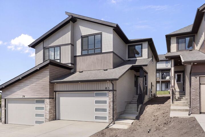 Property Photo:  83 Heritage Manor  AB T4C 3K8 