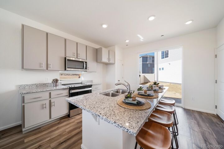 Property Photo:  624 Wagon Wheel Way  CO 80102 