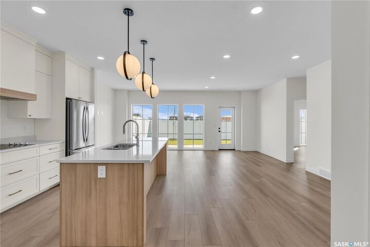 Property Photo: 720 Brighton Boulevard 4 SK S7V 1X1