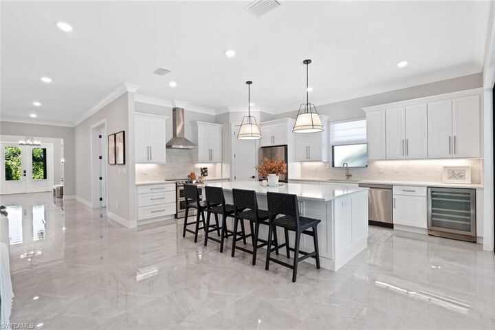 Property Photo:  240 Allamanda Way  FL 34114 