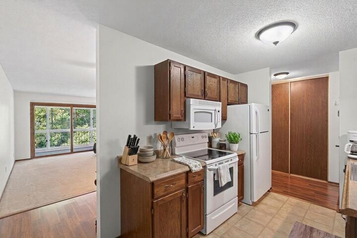 Property Photo:  135 Viking Drive E 309  MN 55117 
