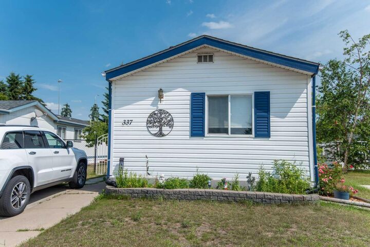 Property Photo: 37543 England Way 337 AB T4S 2C3