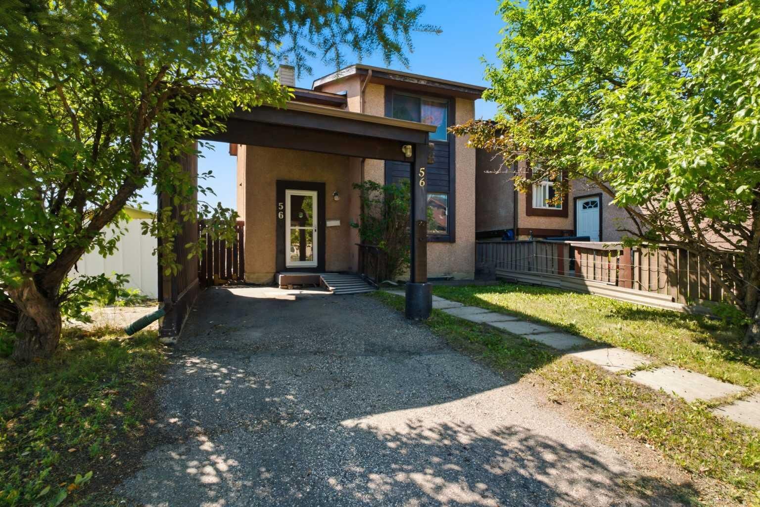 Property Photo:  56 Pinecliff Close NE  AB T1Y 4N5 