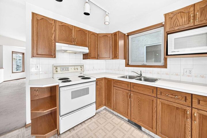 Property Photo: 396 Hawkstone Drive NW AB T3G 3T7
