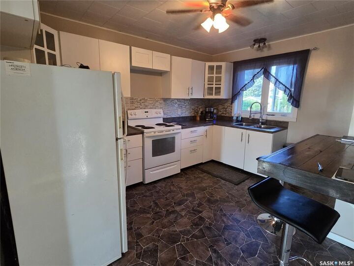 Property Photo: 220 4th Street NW SK S0A 4J0