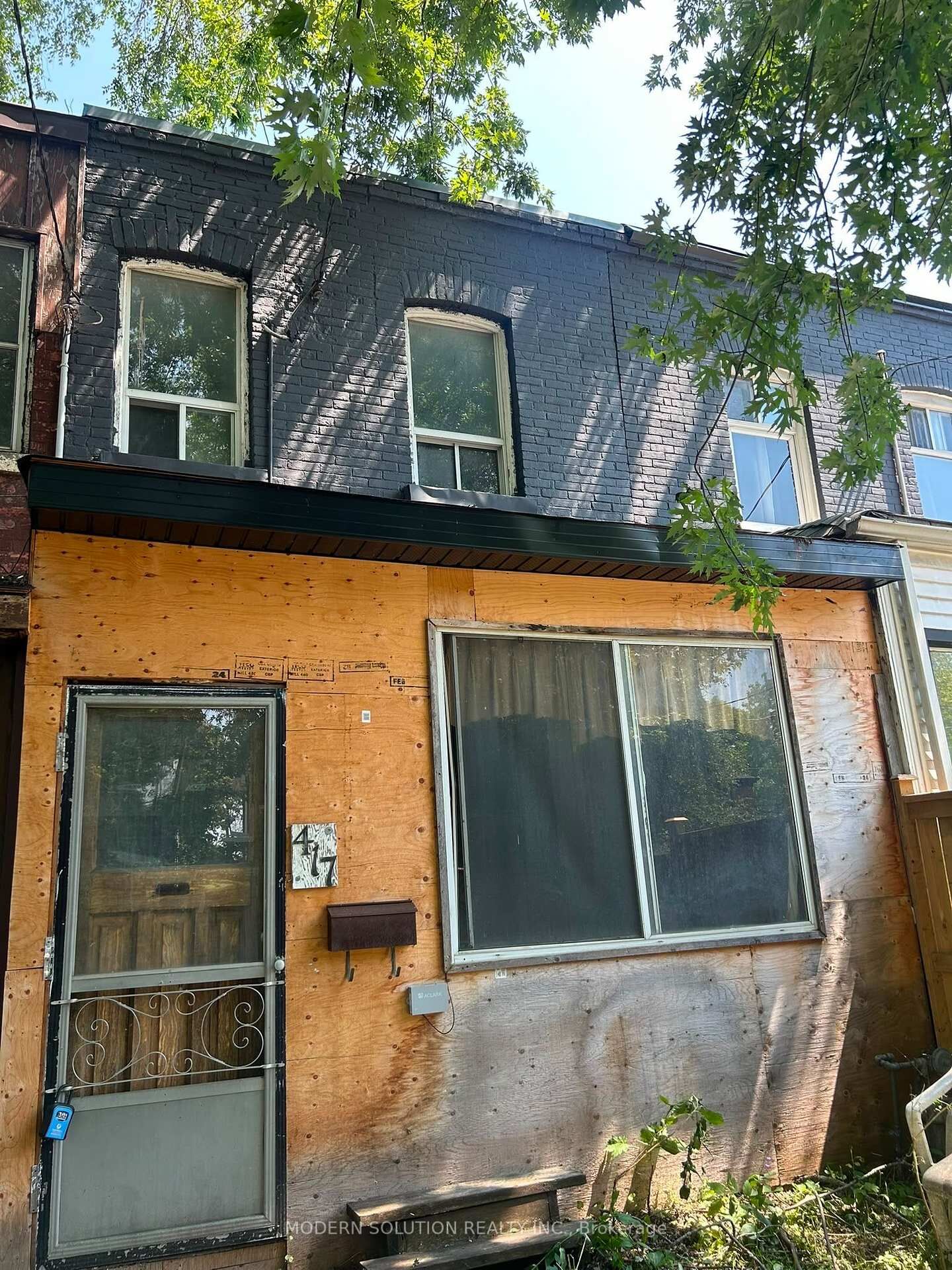 Property Photo: 417 Leslie Street ON M4M 3E3