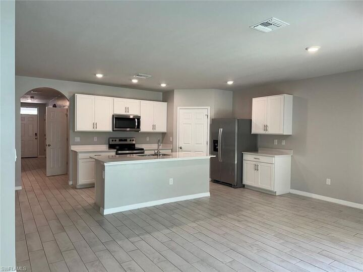 Property Photo: 230 Nicholas Pkwy W FL 33991