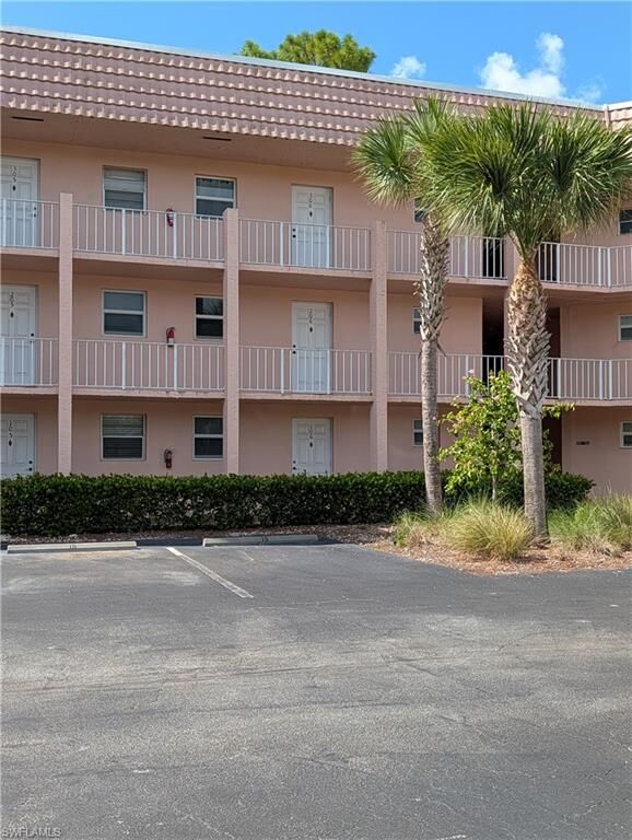 Property Photo:  400 Forest Lakes Blvd 106  FL 34105 
