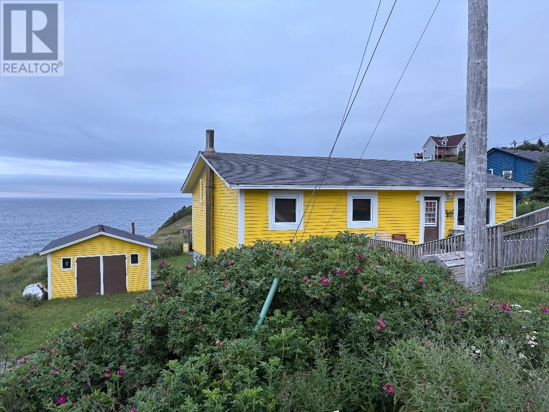 Property Photo:  118-120 Main Road  NL A1Y 1C6 