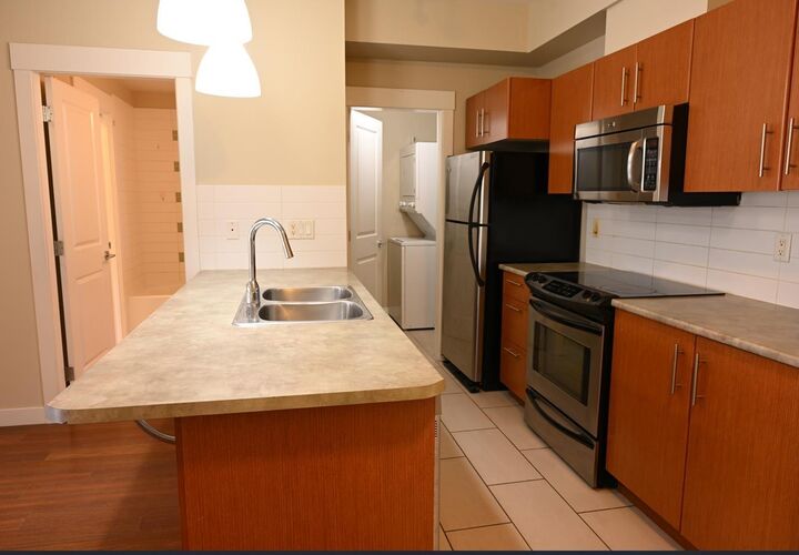 Property Photo:  33545 Rainbow Avenue 202  BC V2S 0B9 
