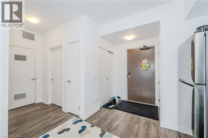 Property Photo:  101 Golden Eagle Road 411  ON N2V 1C3 