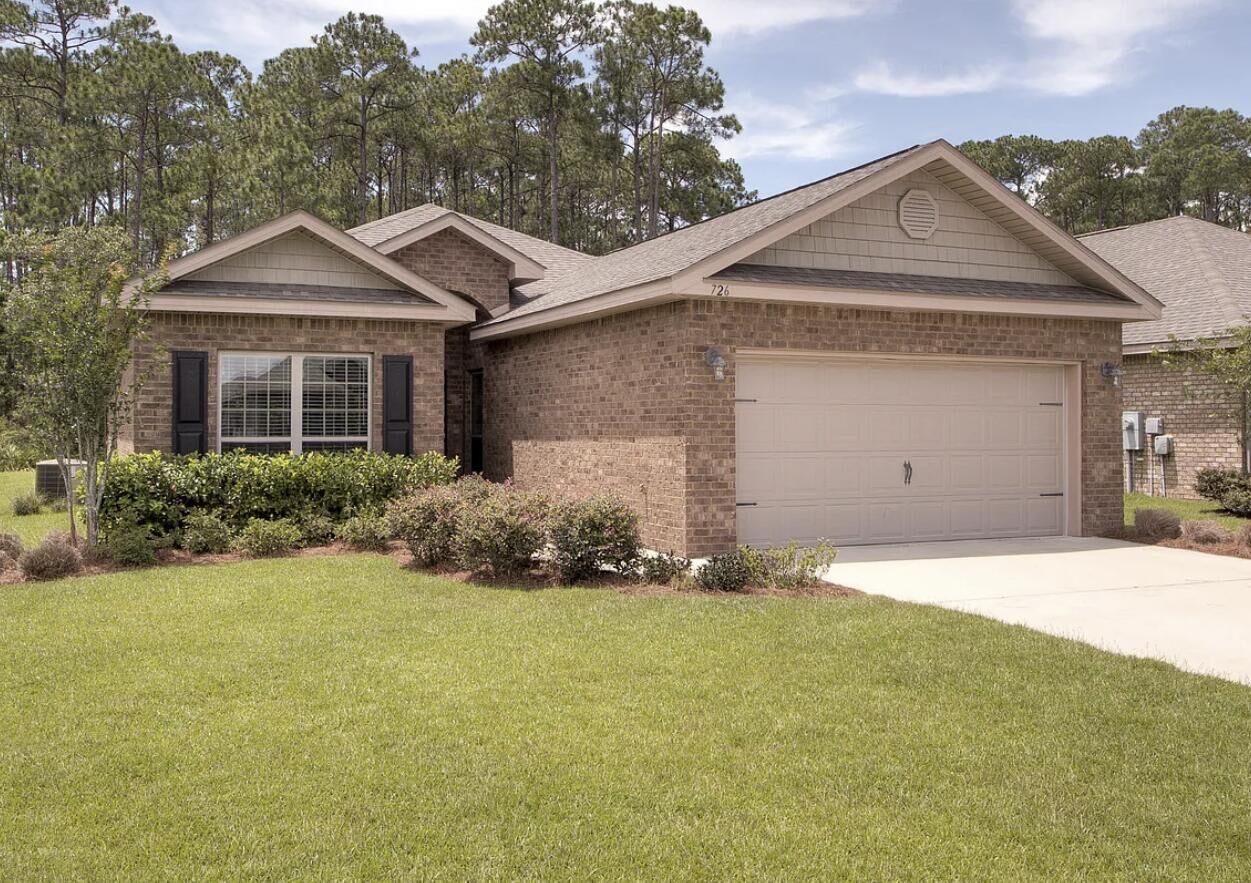 Property Photo:  726 Cocobolo Drive  FL 32459 
