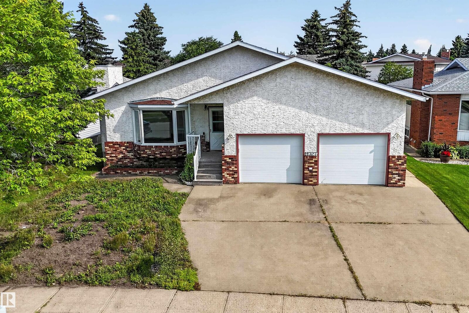 Property Photo: 11327 25 Avenue NW AB T6J 5J1