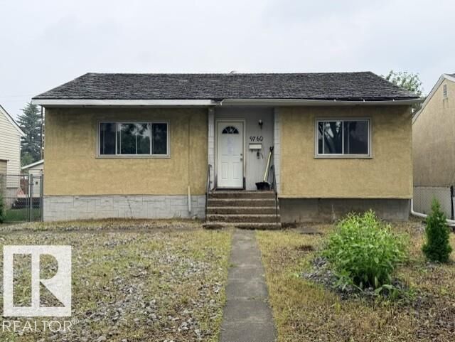 Property Photo:  9760 65 Avenue NW  AB T6E 0K6 