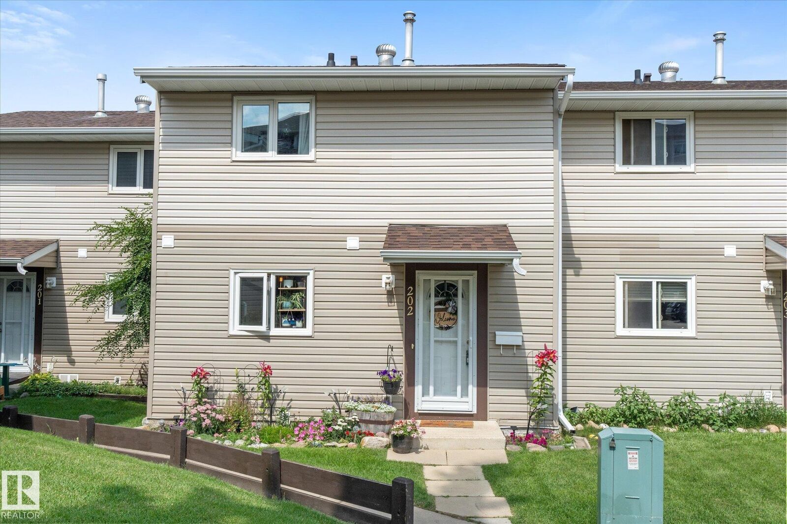 Property Photo:  202 Spruce Glen  AB T7X 2P6 
