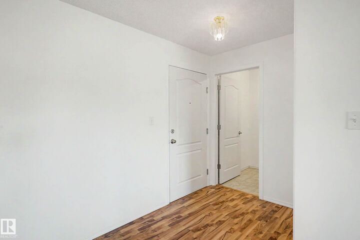 Property Photo: 8119 112 Avenue NW 203 AB T5B 0G1